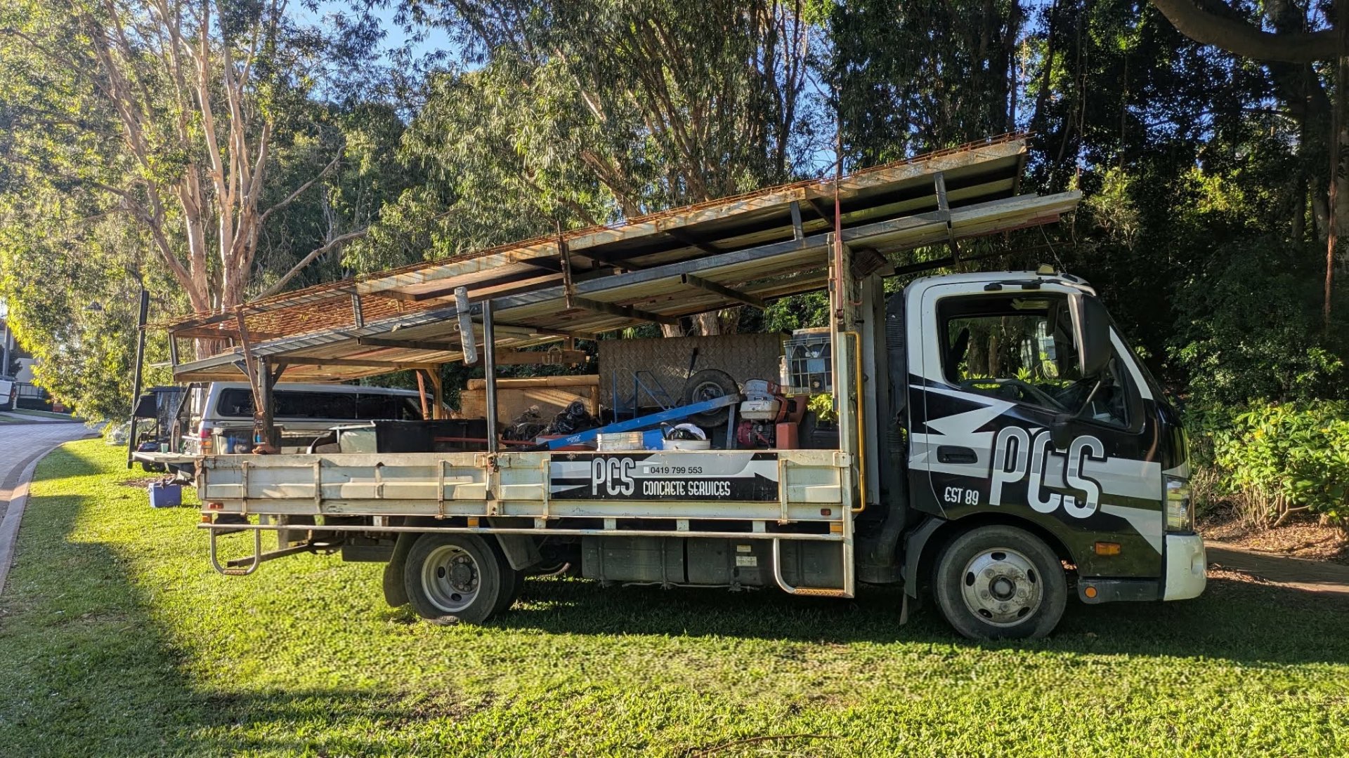 The PCS Concrete Services truck loaded with formwork and gear on the Gold Coast