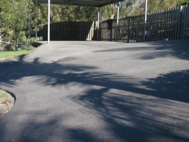 Exposed aggregate driveway completed by Phil's Concrete Service